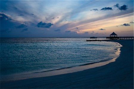 simsearch:700-03403847,k - Beach at Sunset, Banyan Tree Madivaru, Madivaru, Maldives Fotografie stock - Rights-Managed, Codice: 700-03403847