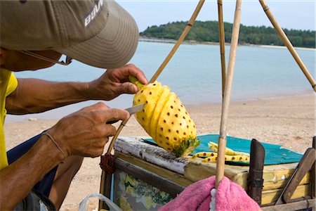 single pineapple - Man Peeling Pineapple, Ko Samui, Thailand Stock Photo - Rights-Managed, Code: 700-03403927