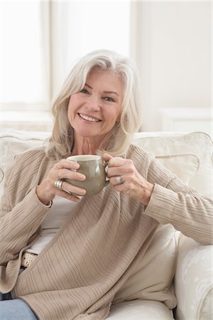 peace of mind and seniors - Woman at Home Relaxing With a Cup of Coffee Stock Photo - Rights-Managed, Code: 700-03438990