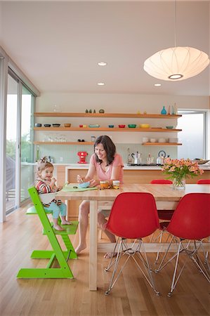 family eating dinner kitchen - Mother and Daughter in Kitchen Stock Photo - Rights-Managed, Code: 700-03439487