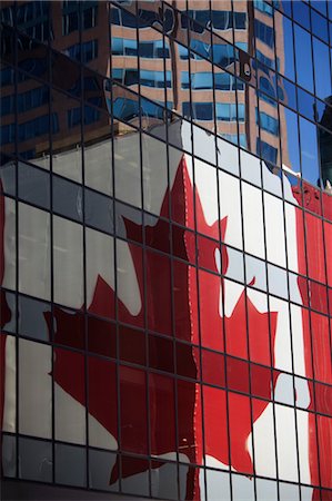 flag canada - Reflection of Canadian Flag on Building, Vancouver, British Columbia, Canada Stock Photo - Rights-Managed, Code: 700-03439569