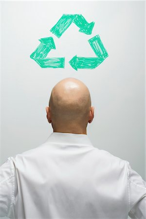 symbole de recyclage - Homme avec symbole dessiné dessus de tête de recyclage Photographie de stock - Rights-Managed, Code: 700-03439584
