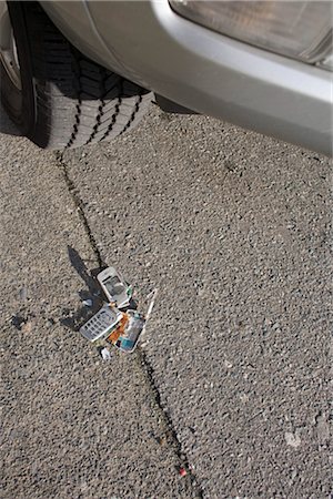 picture of broken cell phone - Car Running over Cell Phone Stock Photo - Rights-Managed, Code: 700-03439597