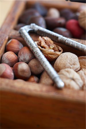 shell and nobody and object - Hazelnuts and Walnuts with Nutcracker Stock Photo - Rights-Managed, Code: 700-03439615