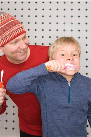 father boy bathroom - Father and Son Brushing Teeth Stock Photo - Rights-Managed, Code: 700-03439888
