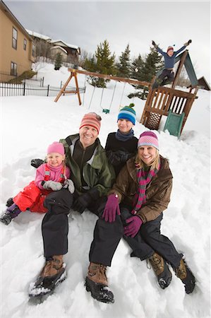 snow covered home - Family in Backyard in Winter, Steamboat Springs, Colorado, USA Stock Photo - Rights-Managed, Code: 700-03439896