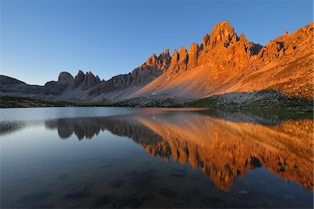 sunrise in the alps - Paternkofel and Laghi dei Piani, Dolomites, Bolzano Province, Alto Adige, South Tyrol, Italy Stock Photo - Rights-Managed, Code: 700-03445275