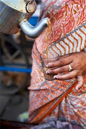 Chai Wallah Pouring Glasses of Masala Chai, India Stock Photo - Rights-Managed, Code: 700-03445327