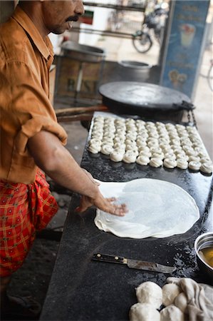 Paratha Bread on a Griddle, Kochi, Kerala, India Fotografie stock - Rights-Managed, Codice: 700-03445331