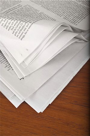 folded - Close-Up of Newspaper Pages Stock Photo - Rights-Managed, Code: 700-03445572