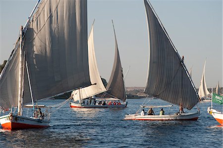 felucca - Felucca Sailing on Nile River, Aswan, Egypt Foto de stock - Con derechos protegidos, Código: 700-03445979