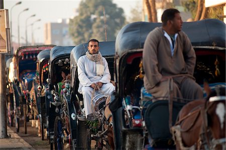 Fiacre Drivers Waiting, Edfu, Egypt Foto de stock - Direito Controlado, Número: 700-03445992