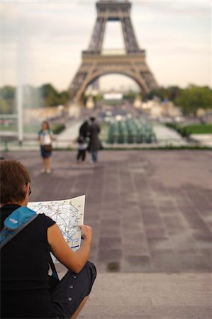 eiffel dusk - Tourist with Map near Eiffel Tower, Paris, France Stock Photo - Rights-Managed, Code: 700-03446083