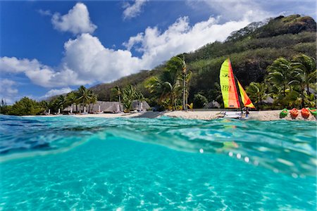 french polynesia - Sailboat on Beach, Motu Toopua, Bora Bora, Tahiti, French Polynesia, Oceania Stock Photo - Rights-Managed, Code: 700-03440194