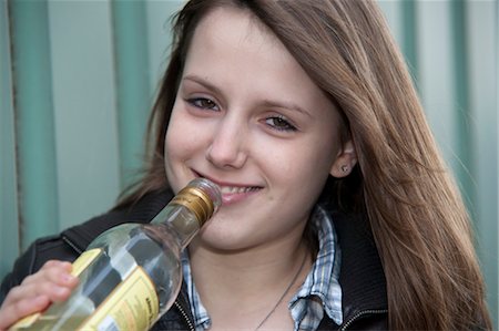 spirits alcohol - Teenage Girl Drinking Alcohol Stock Photo - Rights-Managed, Code: 700-03454507