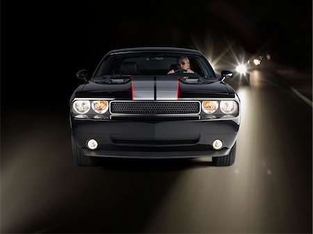 simsearch:700-05451045,k - Man Driving Car at Night Stock Photo - Rights-Managed, Code: 700-03456525