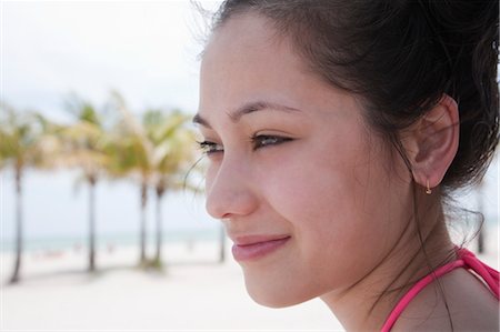 profile face person close up outdoors - Close-up Portrait d'adolescente regardant hors plage, Crandon Park Beach, Key Biscayne, Miami, Florida, USA Photographie de stock - Rights-Managed, Code: 700-03456980