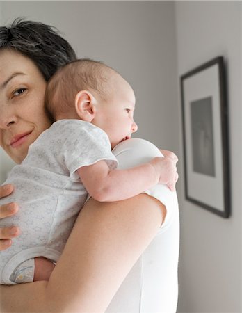 mom carrying baby