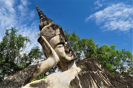 Giant Buddha Statue at Buddha Park, Vientiane Province, Laos Fotografie stock - Rights-Managed, Codice: 700-03451148