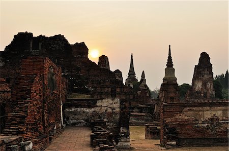 Sunset at Wat Maha That, Ayutthaya, Thailand Stock Photo - Rights-Managed, Code: 700-03451177