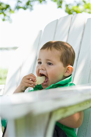 potato chips - Boy Eating Potato Chip Stock Photo - Rights-Managed, Code: 700-03451275