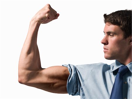 simsearch:700-07278879,k - Businessman Flexing Bicep Stock Photo - Rights-Managed, Code: 700-03466492