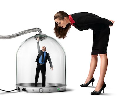 Businesswoman looking at Businessman inside of Pressurized Glass Dome Stock Photo - Rights-Managed, Code: 700-03466502