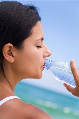 side profile of latina women - Woman Drinking Water Stock Photo - Rights-Managed, Code: 700-03466806