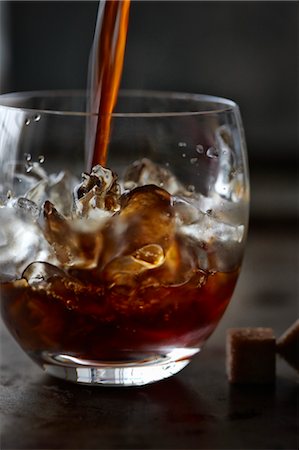 food, dark background - Iced Espresso with Brown Sugar Cubes Stock Photo - Rights-Managed, Code: 700-03478696