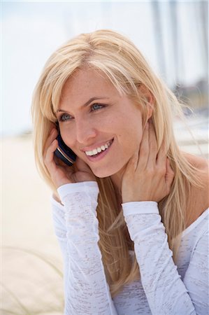 Woman Talking on Cell Phone Stock Photo - Rights-Managed, Code: 700-03484649