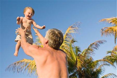 family up - Grandfather Tossing Grandson in Air Stock Photo - Rights-Managed, Code: 700-03484986