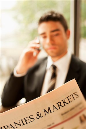 stockmarket - Businessman Reading Newspaper Stock Photo - Rights-Managed, Code: 700-03490345