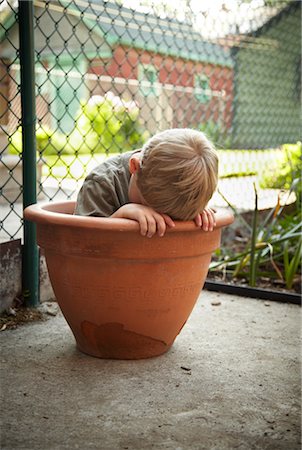 single boy lonely - Toddler in Flowerpot Stock Photo - Rights-Managed, Code: 700-03490378