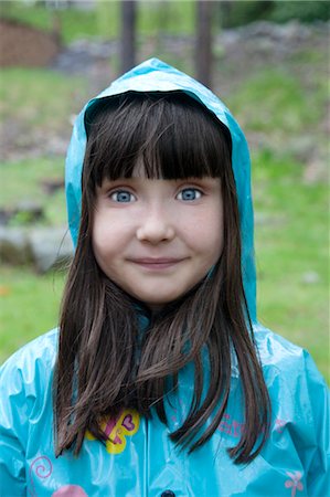 Portrait of Girl in Raincoat Foto de stock - Con derechos protegidos, Código: 700-03506309