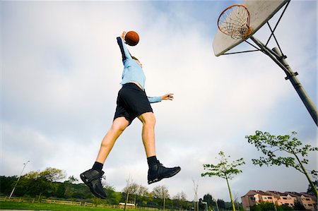 Homme jouer au Basketball Photographie de stock - Rights-Managed, Code: 700-03506300