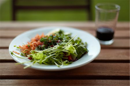 Organic Salad on Table with Beverage Stock Photo - Rights-Managed, Code: 700-03508568