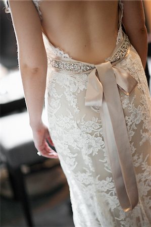 female back dress - Close-Up of Bride Wearing Wedding Gown Stock Photo - Rights-Managed, Code: 700-03508822