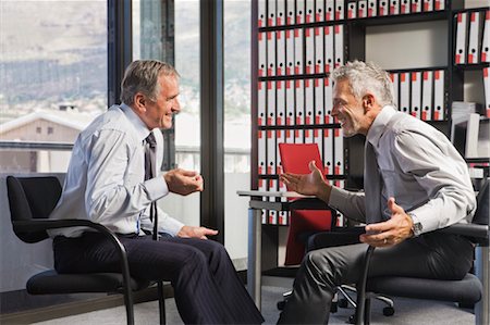 simsearch:700-03503180,k - Two Businessmen Talking in Office Stock Photo - Rights-Managed, Code: 700-03501280