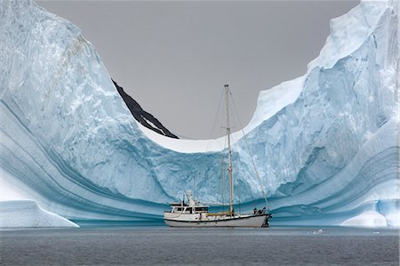 scale not person - Yacht Anchored in Iceberg, Antarctica Stock Photo - Rights-Managed, Code: 700-03503166