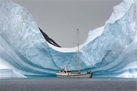 sail boat nobody - Yacht Anchored in Iceberg, Antarctica Stock Photo - Rights-Managed, Code: 700-03503166