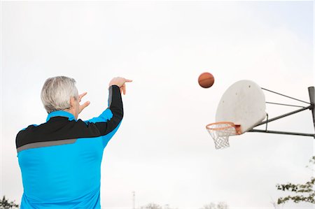 Man Playing Basketball Stock Photo - Rights-Managed, Code: 700-03519168