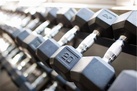 fitness equipment - Dumbbells in Gym Foto de stock - Con derechos protegidos, Código: 700-03554458