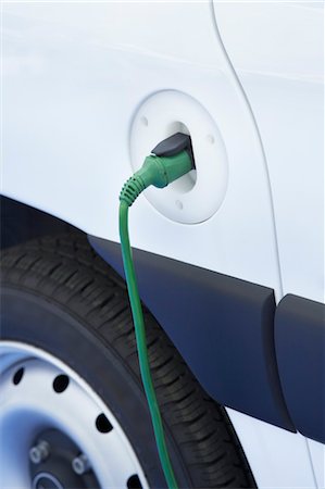 electric vehicle - Close-up of Electric Car Being Charged Stock Photo - Rights-Managed, Code: 700-03556767