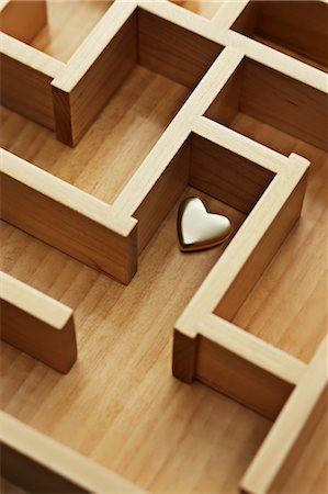 Golden Heart in Wooden Maze Stock Photo - Rights-Managed, Code: 700-03553420