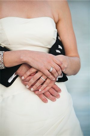 Close-up of Bride and Groom Hugging Foto de stock - Con derechos protegidos, Código: 700-03567858