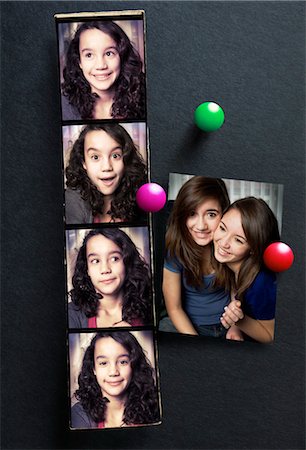 family memories - Photographs of Teenage Girls on Bulletin Board Stock Photo - Rights-Managed, Code: 700-03567940