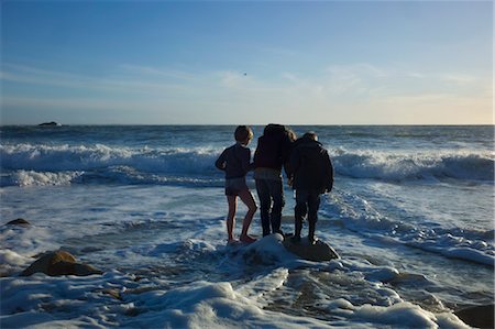 Three Boys Standing on Rock at Beach in Winter, Quiberon, Gulf of Morbihan, France Stock Photo - Rights-Managed, Code: 700-03567981