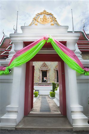simsearch:851-02963398,k - Doorway Draped with Pink and Green Cloth at Wat Arun Temple, Thon Buri, Bangkok, Thailand Stock Photo - Rights-Managed, Code: 700-03586792