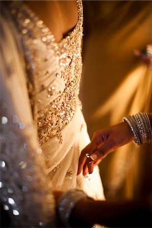 detailed jewelry - Hands Pinning Bride's Dress Stock Photo - Rights-Managed, Code: 700-03587180