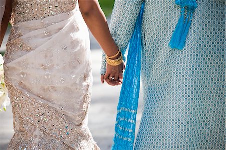 sequins - Bride and Groom Holding Hands Stock Photo - Rights-Managed, Code: 700-03587196